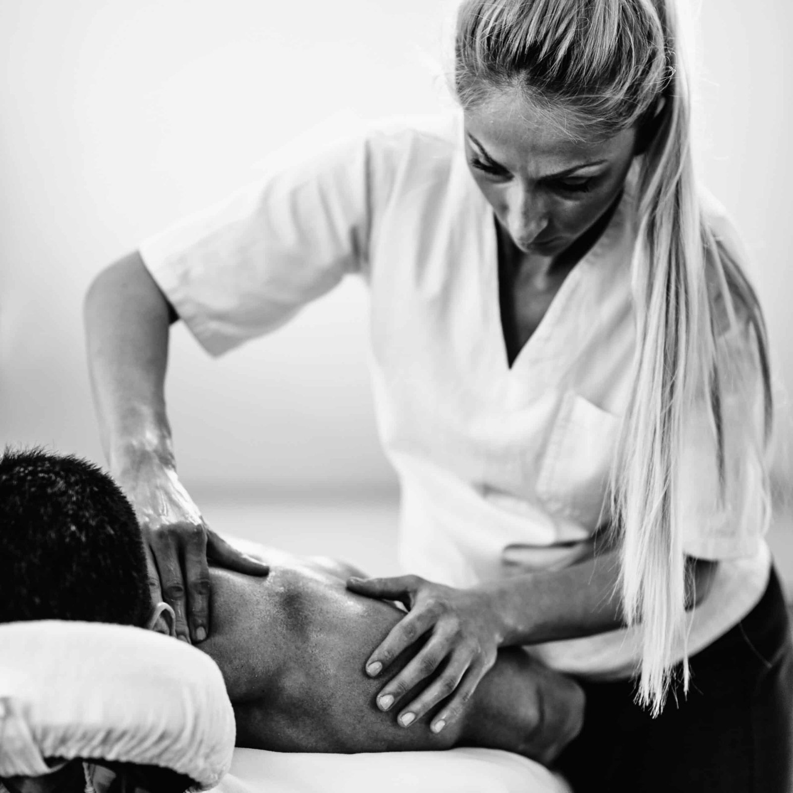 Sports massage - Shoulders woman massage mans back
